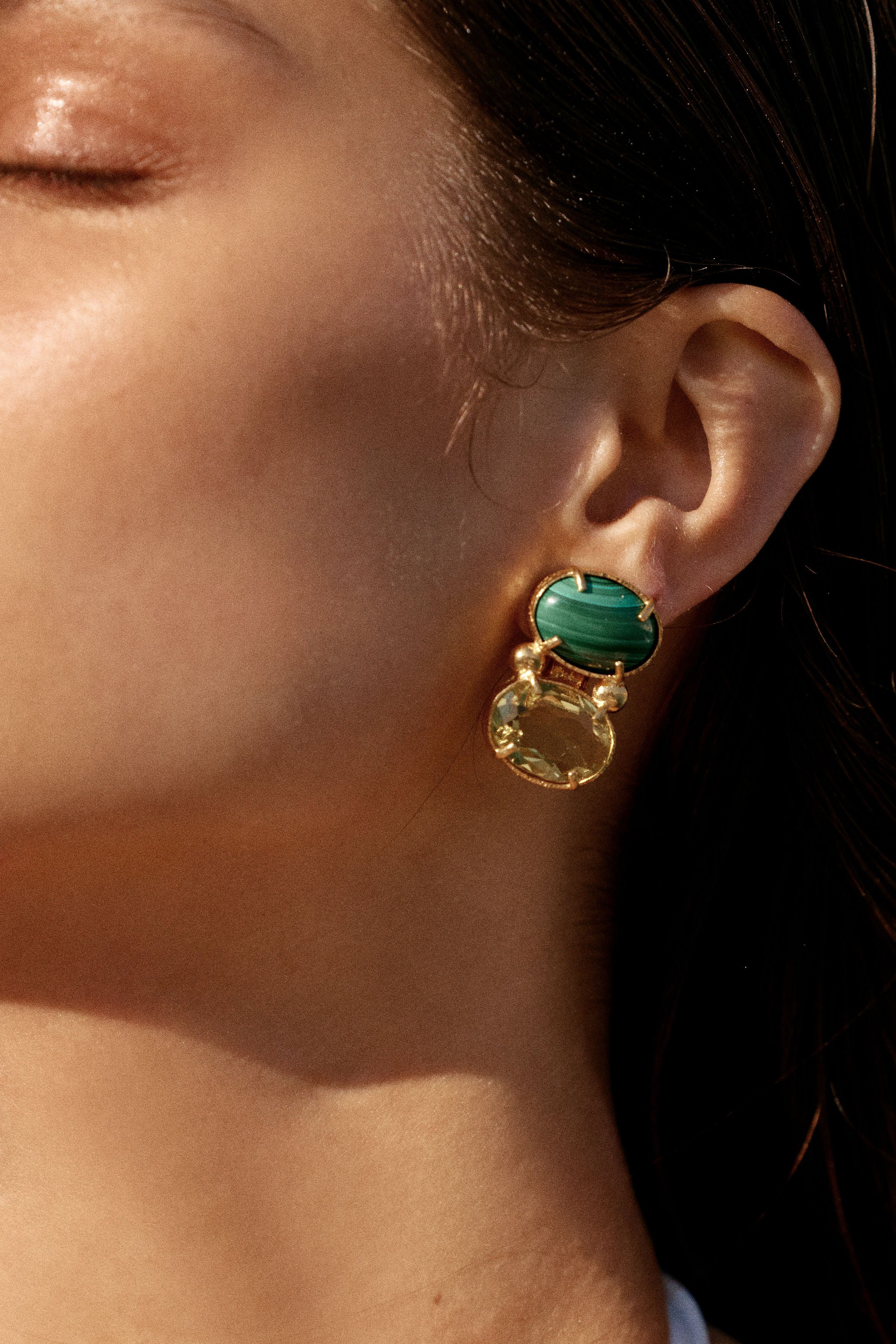 Christie Nicolaides Lolli statement stud earrings with Malachite and green crystal stones, 24k gold plated brass on model