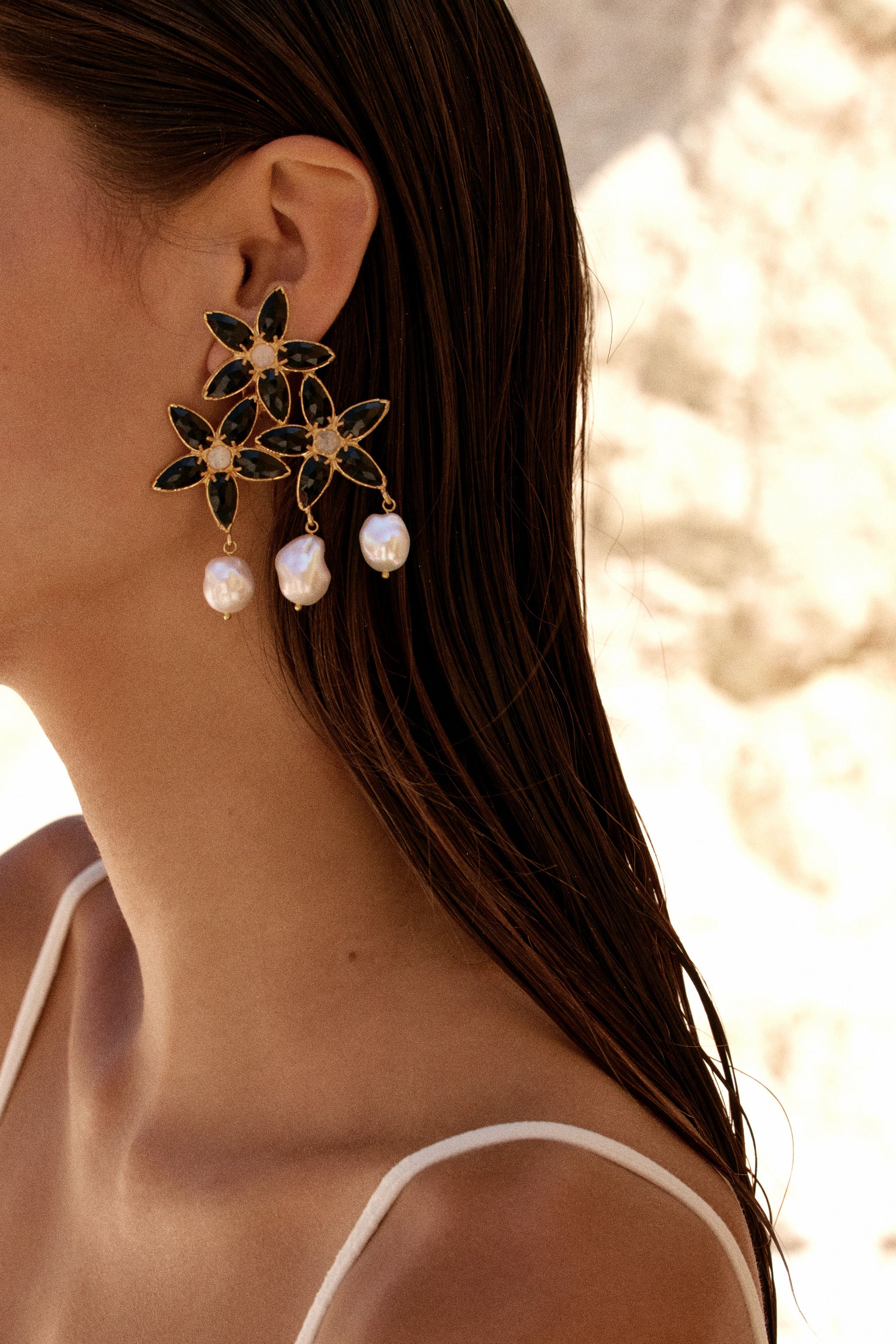 Christie Nicolaides Cleo statement drop earrings with black stones and baroque freshwater pearl, 24k gold plated brass