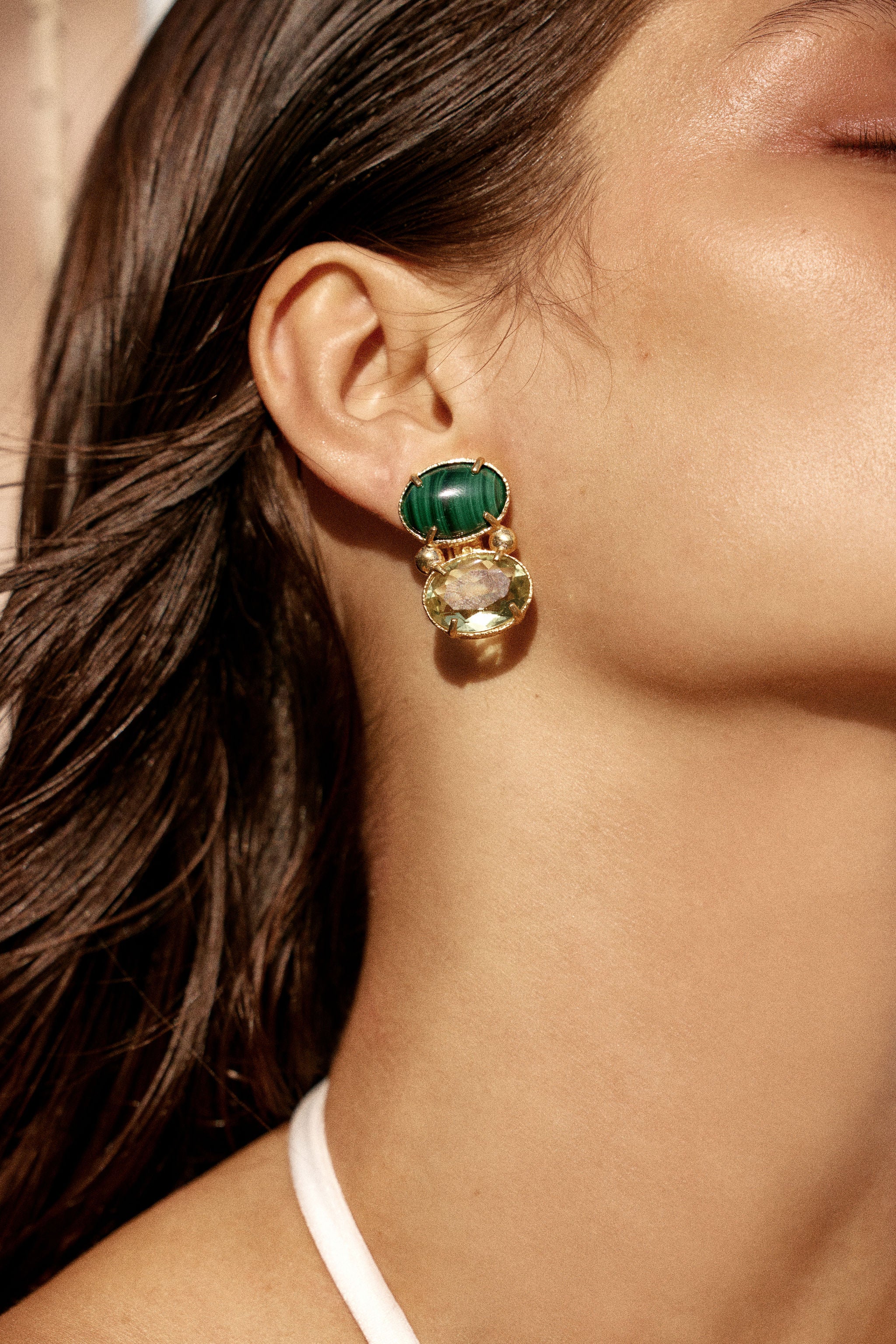 Christie Nicolaides Lolli statement stud earrings with Malachite and green crystal stones, 24k gold plated brass on model